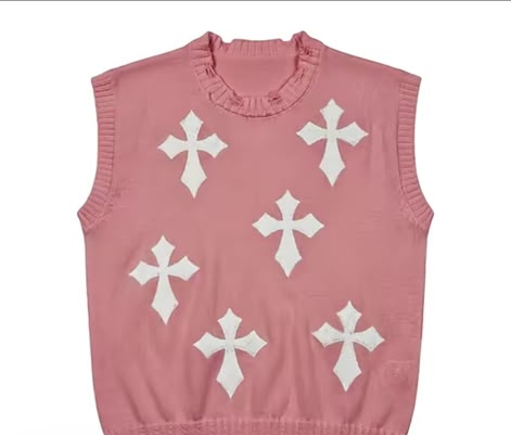 A flat listing photo of a pink knit vest with white crosses